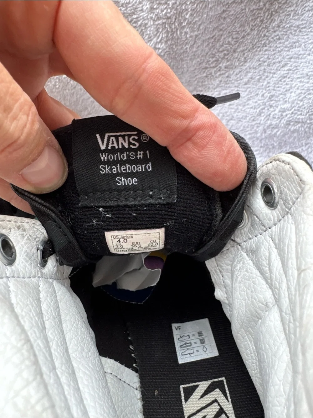 Vans Kids' High-Top Checkerboard Sneakers in Black with Teal Accent